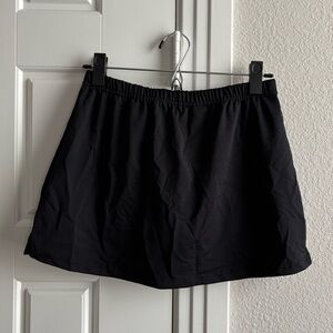 Augusta Sportswear mini skort; black (size M)